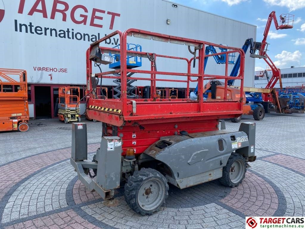 Haulotte Compact 12DX Diesel 4x4 Scissor Work Lift 1206cm - Žirklinis keltuvas: foto 1 Haulotte Compact 12DX Diesel 4x4 Scissor Work Lift 1206cm - Žirklinis keltuvas: foto 1