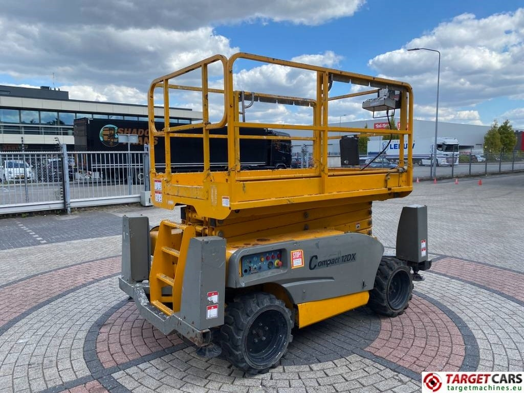Haulotte Compact 12DX Diesel 4x4 Scissor Work Lift 1206cm - Žirklinis keltuvas: foto 3 Haulotte Compact 12DX Diesel 4x4 Scissor Work Lift 1206cm - Žirklinis keltuvas: foto 3
