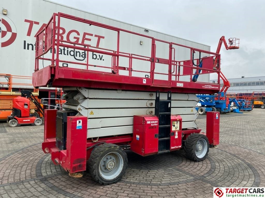 MEC 6092RT Diesel 4x4 Scissor Work LIft 2020cm - Žirklinis keltuvas: foto 1 MEC 6092RT Diesel 4x4 Scissor Work LIft 2020cm - Žirklinis keltuvas: foto 1