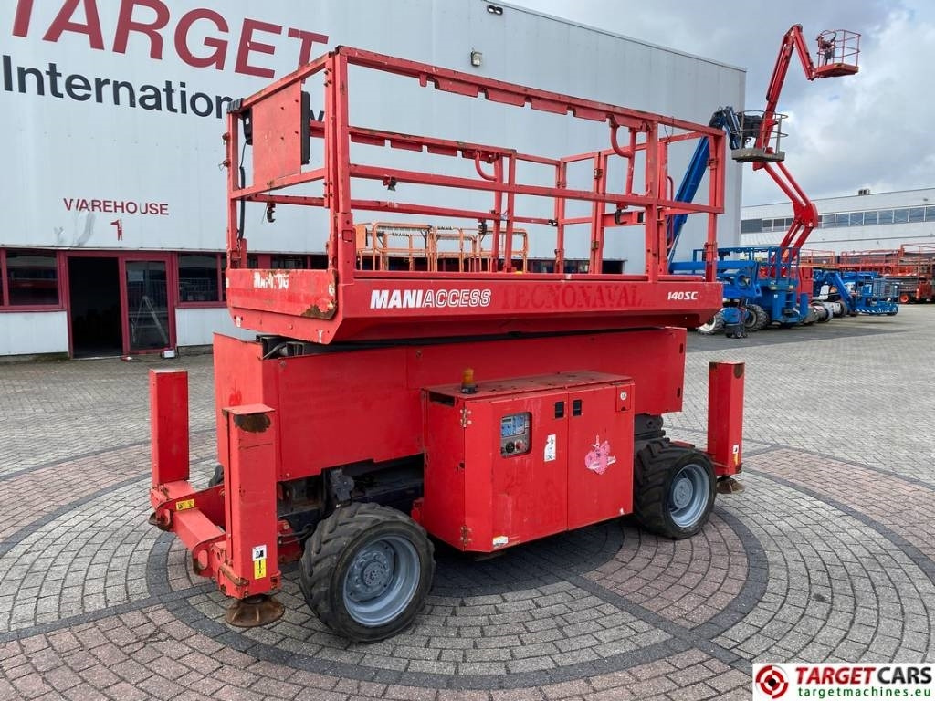 Manitou 140SC Diesel 4x4 Scissor Work Lift 1412cm - Žirklinis keltuvas: foto 1 Manitou 140SC Diesel 4x4 Scissor Work Lift 1412cm - Žirklinis keltuvas: foto 1