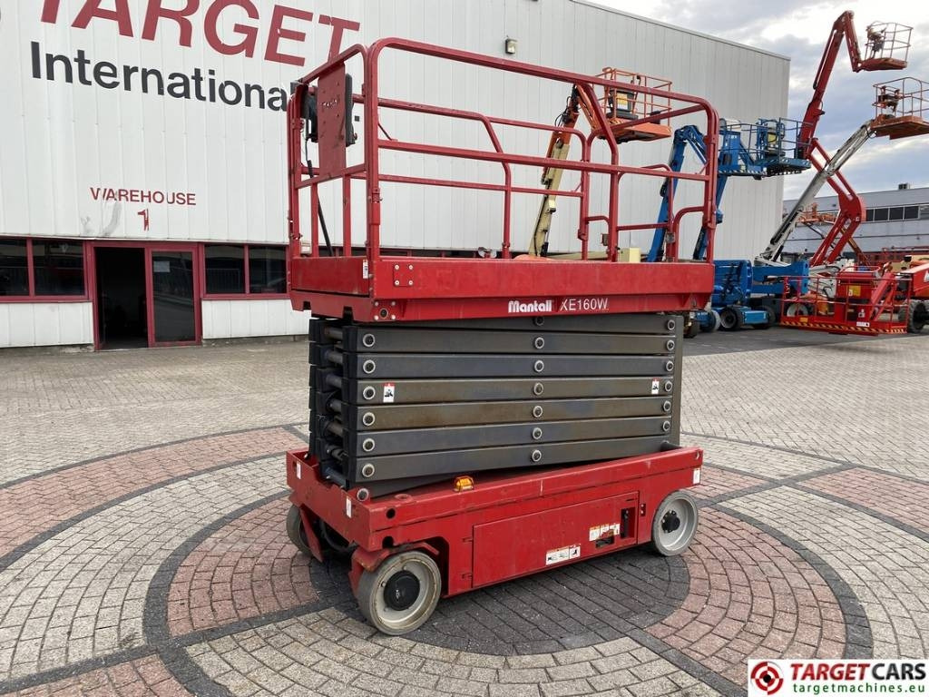 Mantall XE160W Electric Scissor Work LIft 1600cm - Žirklinis keltuvas: foto 1 Mantall XE160W Electric Scissor Work LIft 1600cm - Žirklinis keltuvas: foto 1