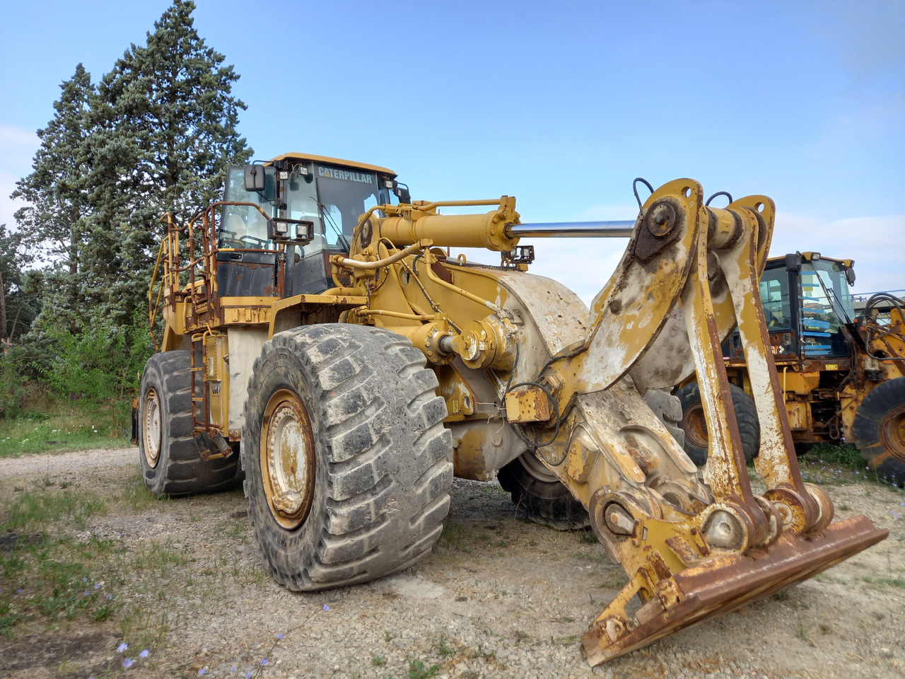 Caterpillar 988H Pala gommata 988H in buone condizione. - Ratinis krautuvas: foto 1 Caterpillar 988H Pala gommata 988H in buone condizione. - Ratinis krautuvas: foto 1