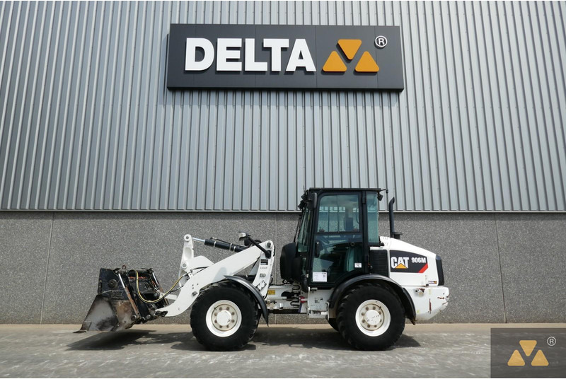 Caterpillar 906M - Ratinis krautuvas: foto 1 Caterpillar 906M - Ratinis krautuvas: foto 1