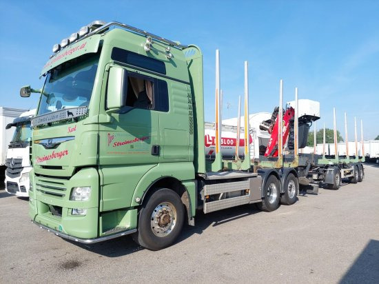 MAN TGX 26.500 6x4x4 Holztransporter, Motor Neu - Miškovežis, Sunkvežimis su kranu: foto 1 MAN TGX 26.500 6x4x4 Holztransporter, Motor Neu - Miškovežis, Sunkvežimis su kranu: foto 1