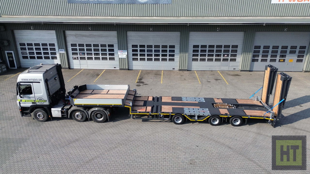 Meusburger 3-Achs-Tele-Semi mit 1 Paar Radmulden und hydr. Rampen - Žemo profilio platforma puspriekabė: foto 3 Meusburger 3-Achs-Tele-Semi mit 1 Paar Radmulden und hydr. Rampen - Žemo profilio platforma puspriekabė: foto 3