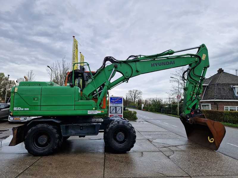 Hyundai Robex 160W-9A met 6-cilinder Cummins motor - Ratinis ekskavatorius: foto 2 Hyundai Robex 160W-9A met 6-cilinder Cummins motor - Ratinis ekskavatorius: foto 2