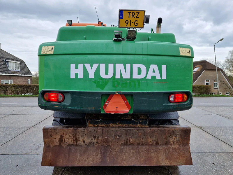 Hyundai Robex 160W-9A met 6-cilinder Cummins motor - Ratinis ekskavatorius: foto 3 Hyundai Robex 160W-9A met 6-cilinder Cummins motor - Ratinis ekskavatorius: foto 3