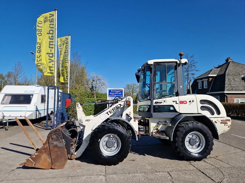Terex TL80 palletvorken en 4in1-bak - Ratinis krautuvas: foto 1 Terex TL80 palletvorken en 4in1-bak - Ratinis krautuvas: foto 1