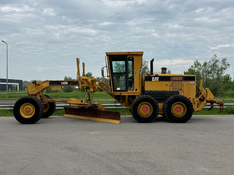 Caterpillar 140H - Greideris: foto 1 Caterpillar 140H - Greideris: foto 1
