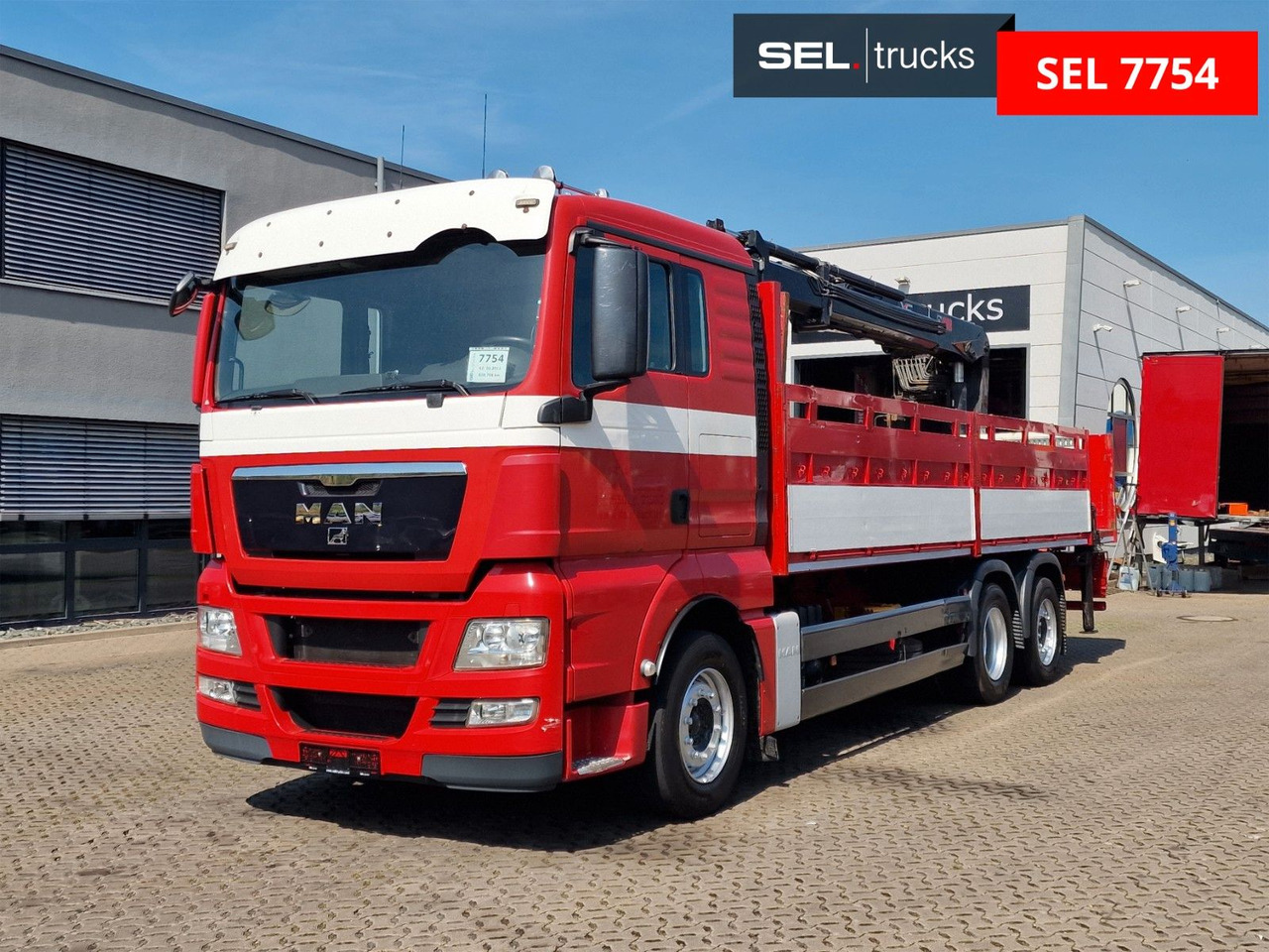 MAN TGX 26.400 6x2-2 BL/ Intarder / HIAB / Lenkachse - Sunkvežimis su kranu: foto 1 MAN TGX 26.400 6x2-2 BL/ Intarder / HIAB / Lenkachse - Sunkvežimis su kranu: foto 1