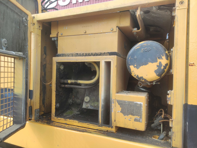 Ratinis ekskavatorius Caterpillar 214 B wheel excavator: foto 12