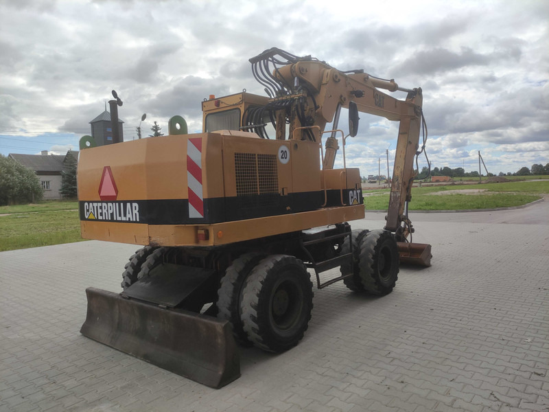 Ratinis ekskavatorius Caterpillar 214 B wheel excavator: foto 10