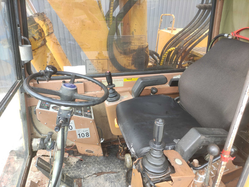 Ratinis ekskavatorius Caterpillar 214 B wheel excavator: foto 17