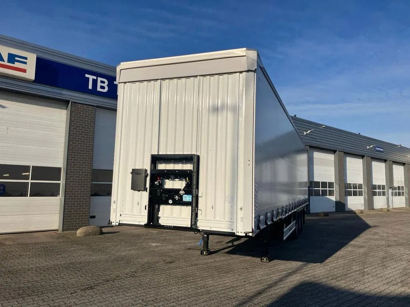 Kässbohrer SCS X / 90 - 12 / 27 Schuifzeilen met twee liftassen en hefdak 500mm - Tentinė puspriekabė: foto 3 Kässbohrer SCS X / 90 - 12 / 27 Schuifzeilen met twee liftassen en hefdak 500mm - Tentinė puspriekabė: foto 3