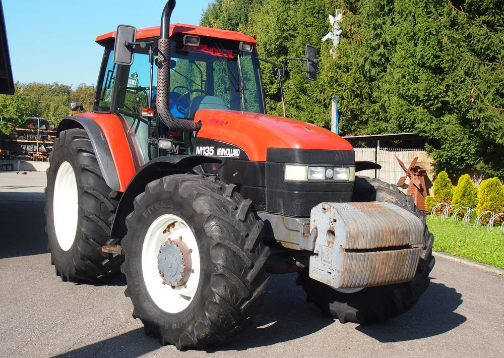 Ciągnik New Holland NH M 135 1998 NEW HOLLAND TM M135 - Traktorius: foto 1 Ciągnik New Holland NH M 135 1998 NEW HOLLAND TM M135 - Traktorius: foto 1
