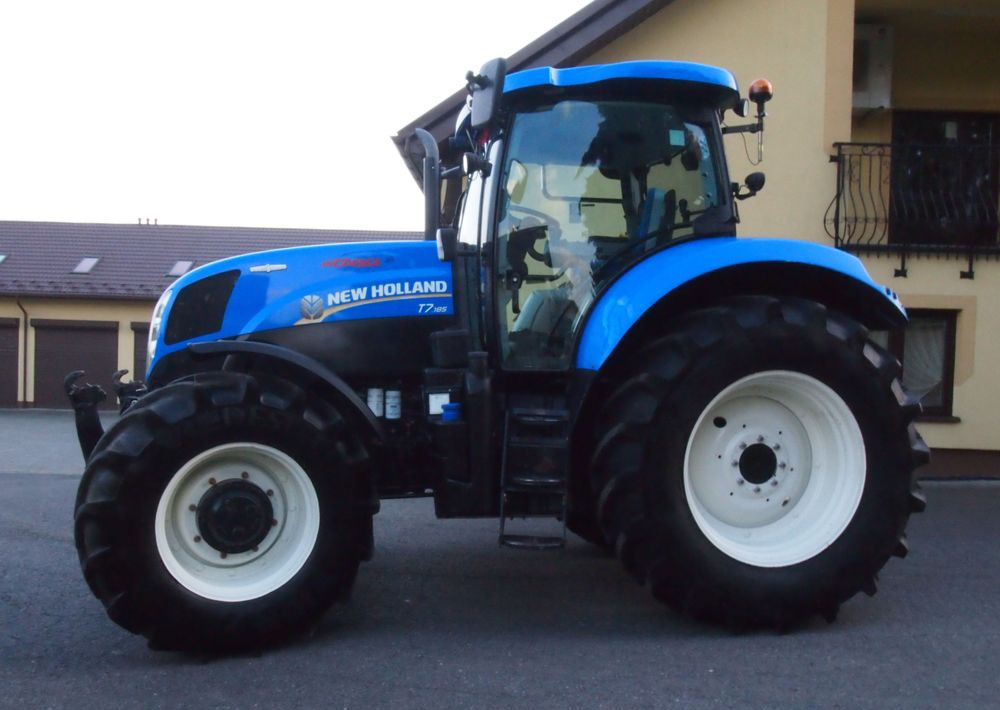 Ciągnik New Holland T7.185 2013 New Holland Autocommand i TUZ - Traktorius: foto 2 Ciągnik New Holland T7.185 2013 New Holland Autocommand i TUZ - Traktorius: foto 2