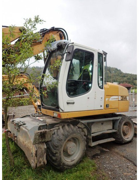 Liebherr A 314 - Ratinis ekskavatorius: foto 1 Liebherr A 314 - Ratinis ekskavatorius: foto 1