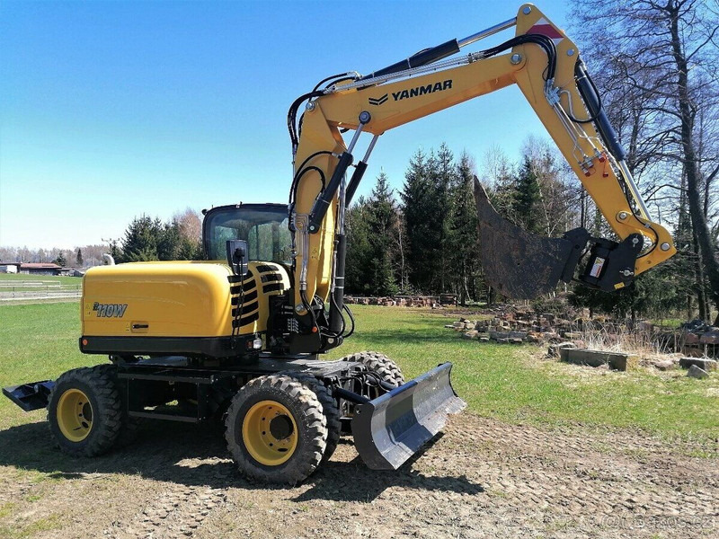 Yanmar B110 W - Ratinis ekskavatorius: foto 1 Yanmar B110 W - Ratinis ekskavatorius: foto 1