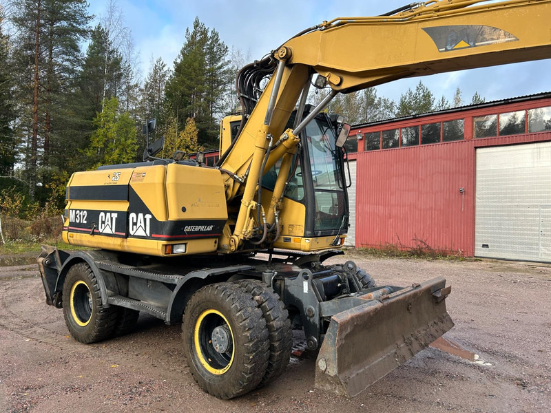 Caterpillar M312 Engcon EC20 tiltrotator - Ratinis ekskavatorius: foto 4 Caterpillar M312 Engcon EC20 tiltrotator - Ratinis ekskavatorius: foto 4