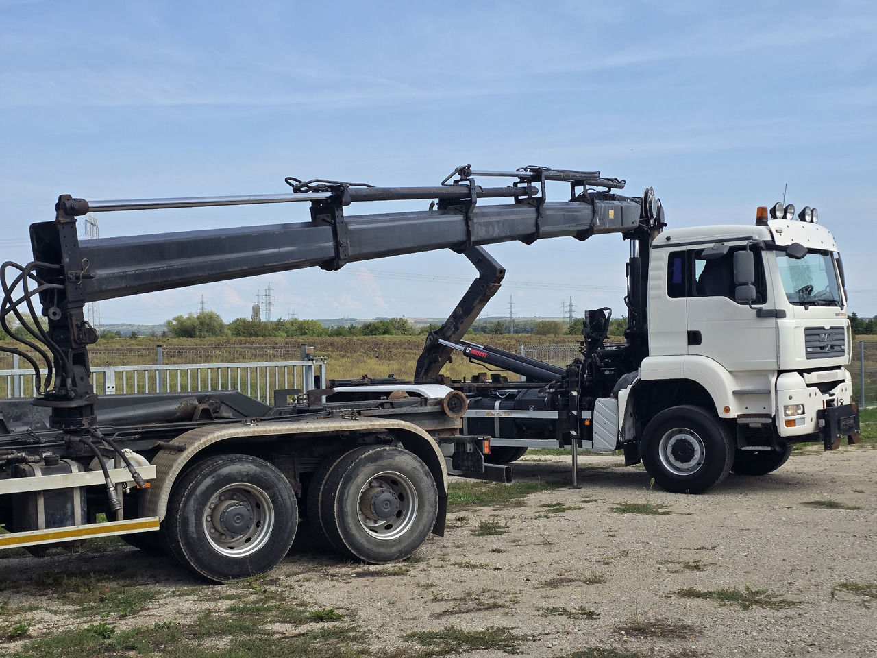 MAN TGA 26.440 6X6 / HOOK SYSTEM / HIAB 166D REMOTE - Hook-lift sunkvežimis, Sunkvežimis su kranu: foto 4 MAN TGA 26.440 6X6 / HOOK SYSTEM / HIAB 166D REMOTE - Hook-lift sunkvežimis, Sunkvežimis su kranu: foto 4