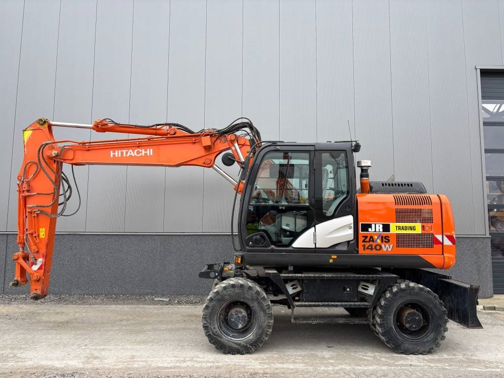 Hitachi ZX 140 W-5B - Ratinis ekskavatorius: foto 1 Hitachi ZX 140 W-5B - Ratinis ekskavatorius: foto 1