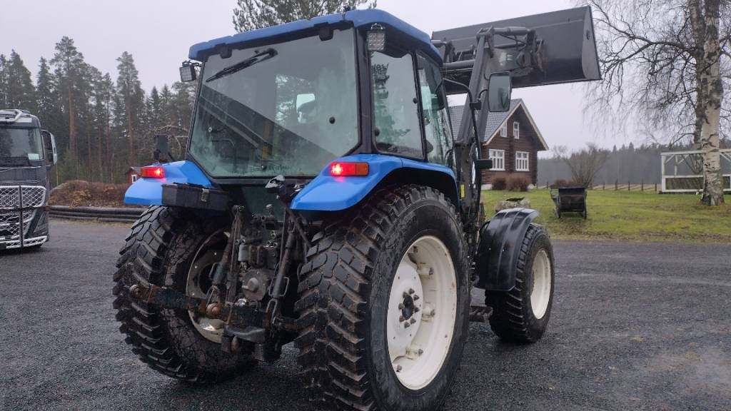 New Holland TL90 trima kuormaaja, sähköinen suunnanvaihtaja - Traktorius: foto 5 New Holland TL90 trima kuormaaja, sähköinen suunnanvaihtaja - Traktorius: foto 5