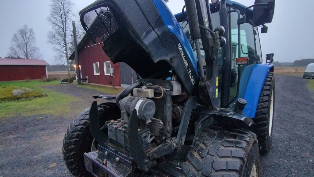 New Holland TL90 trima kuormaaja, sähköinen suunnanvaihtaja - Traktorius: foto 3 New Holland TL90 trima kuormaaja, sähköinen suunnanvaihtaja - Traktorius: foto 3