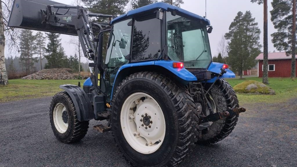 New Holland TL90 trima kuormaaja, sähköinen suunnanvaihtaja - Traktorius: foto 4 New Holland TL90 trima kuormaaja, sähköinen suunnanvaihtaja - Traktorius: foto 4