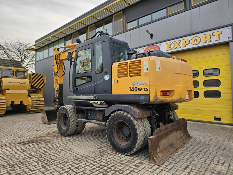 Hyundai R140W-7A - Ratinis ekskavatorius: foto 3 Hyundai R140W-7A - Ratinis ekskavatorius: foto 3