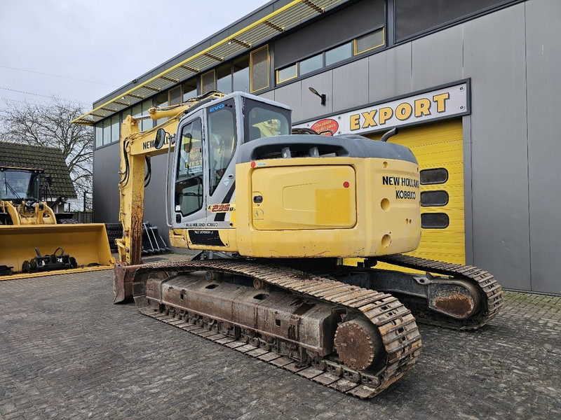 New Holland E235BSR-2 - Vikšrinis ekskavatorius: foto 3 New Holland E235BSR-2 - Vikšrinis ekskavatorius: foto 3