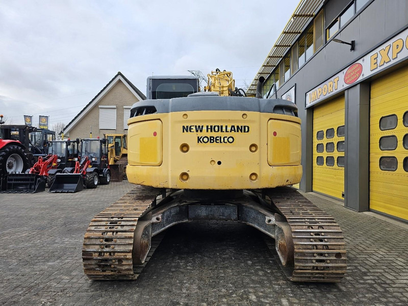 New Holland E235BSR-2 - Vikšrinis ekskavatorius: foto 4 New Holland E235BSR-2 - Vikšrinis ekskavatorius: foto 4