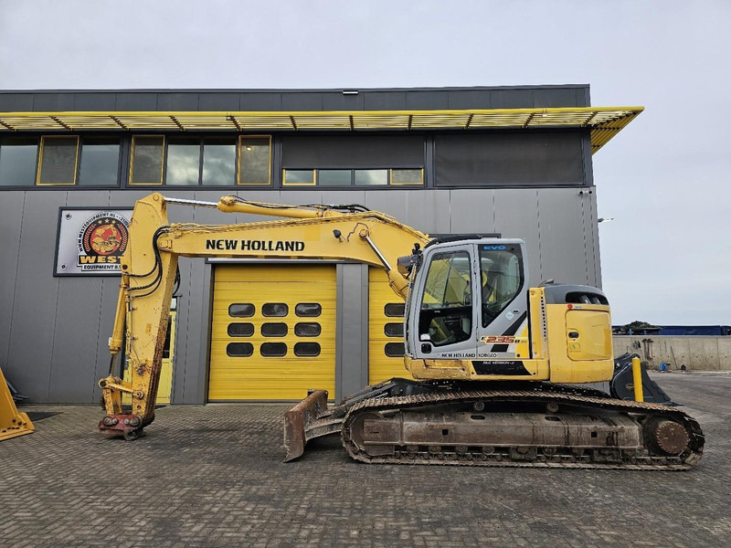 New Holland E235BSR-2 - Vikšrinis ekskavatorius: foto 1 New Holland E235BSR-2 - Vikšrinis ekskavatorius: foto 1