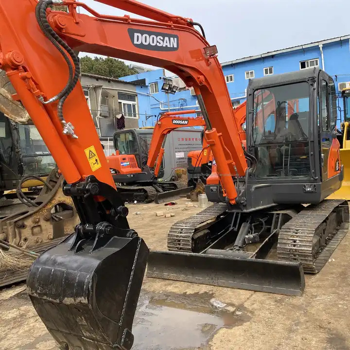 Used excavator Doosan DX60 with excellent working condition on sale Used Doosan DX60 excavator, Doosan DX60 mini excavators - Vikšrinis ekskavatorius: foto 1 Used excavator Doosan DX60 with excellent working condition on sale Used Doosan DX60 excavator, Doosan DX60 mini excavators - Vikšrinis ekskavatorius: foto 1