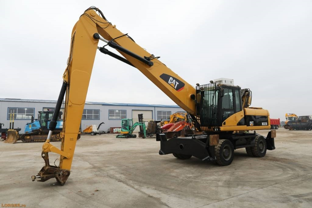 CAT M 322 D - Ekskavatorius su ilga strėle: foto 1 CAT M 322 D - Ekskavatorius su ilga strėle: foto 1