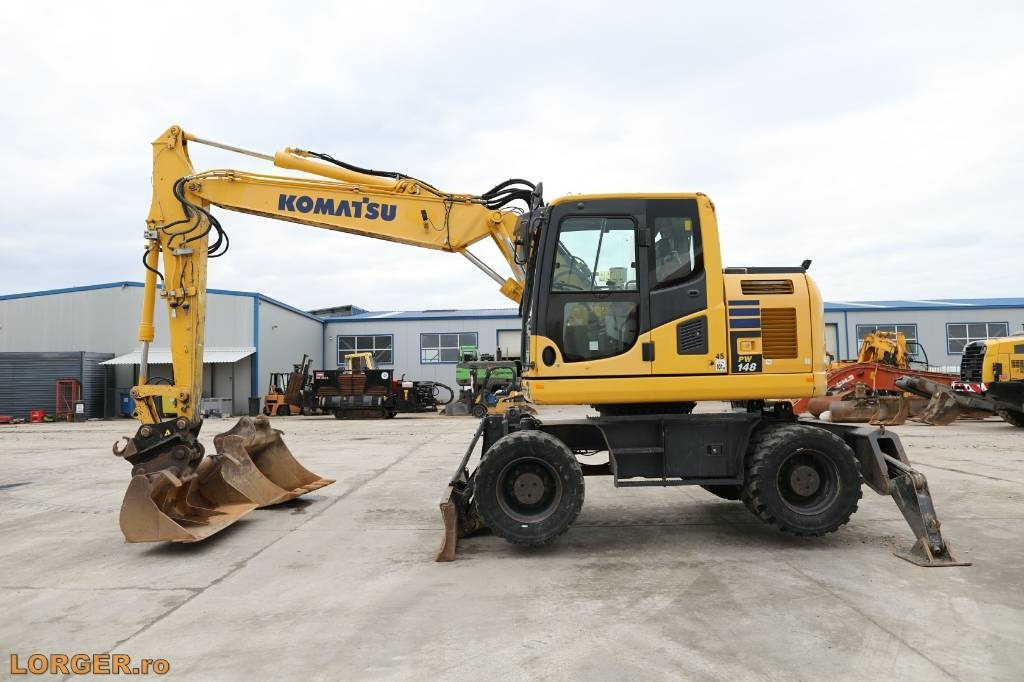 Komatsu PW 148-10 - Ratinis ekskavatorius: foto 1 Komatsu PW 148-10 - Ratinis ekskavatorius: foto 1