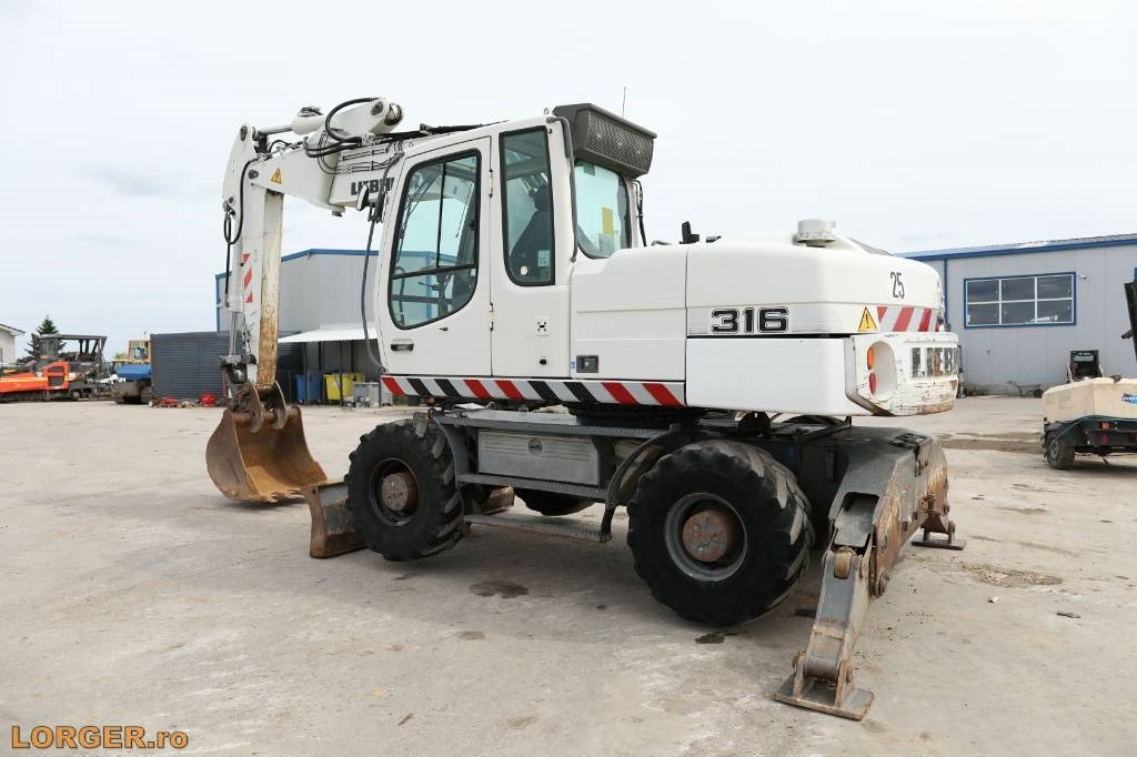 Liebherr A 316 Litronic - Ratinis ekskavatorius: foto 3 Liebherr A 316 Litronic - Ratinis ekskavatorius: foto 3