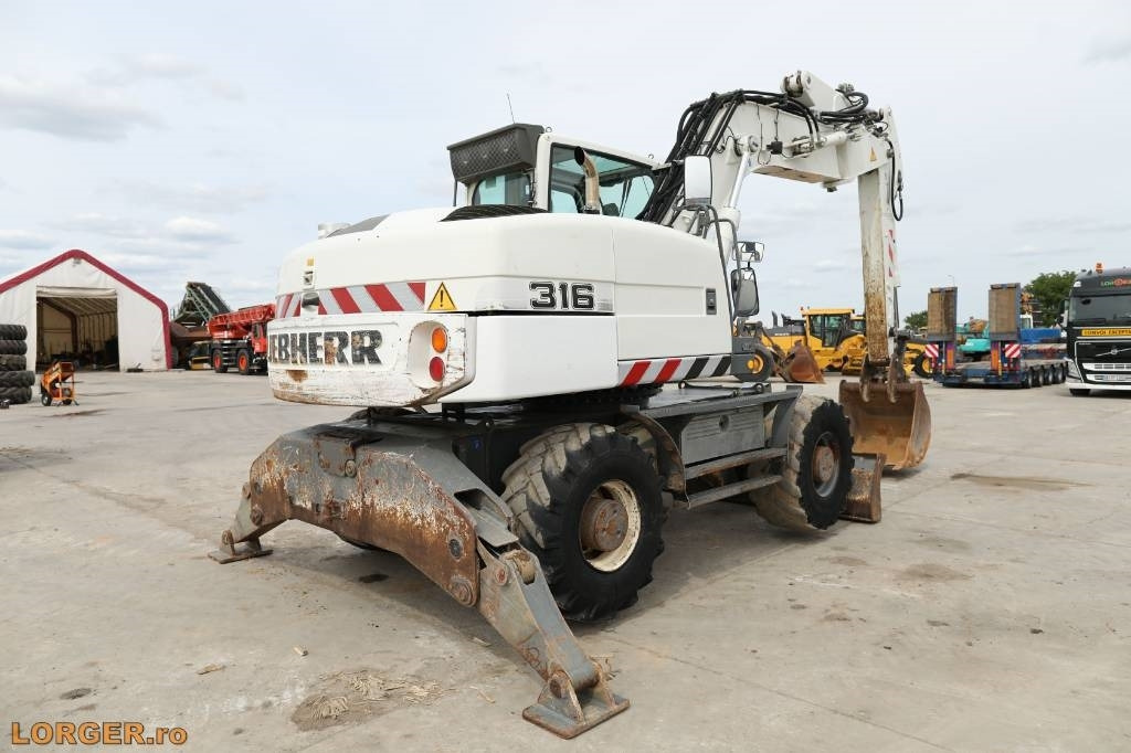 Liebherr A 316 Litronic - Ratinis ekskavatorius: foto 2 Liebherr A 316 Litronic - Ratinis ekskavatorius: foto 2