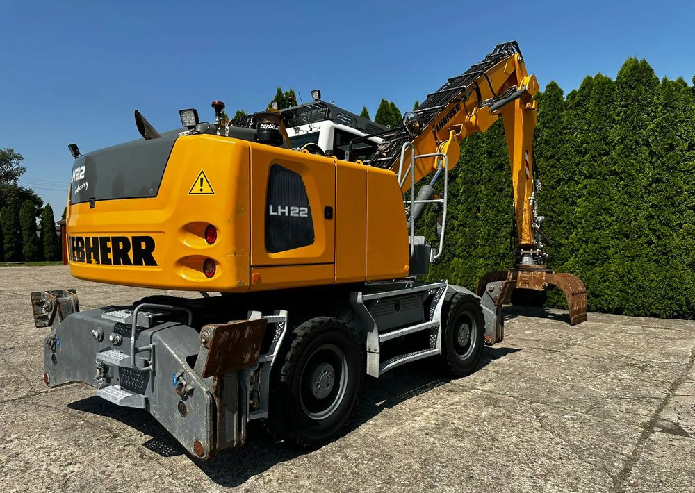 Liebherr LH22 M - Ratinis ekskavatorius: foto 1 Liebherr LH22 M - Ratinis ekskavatorius: foto 1