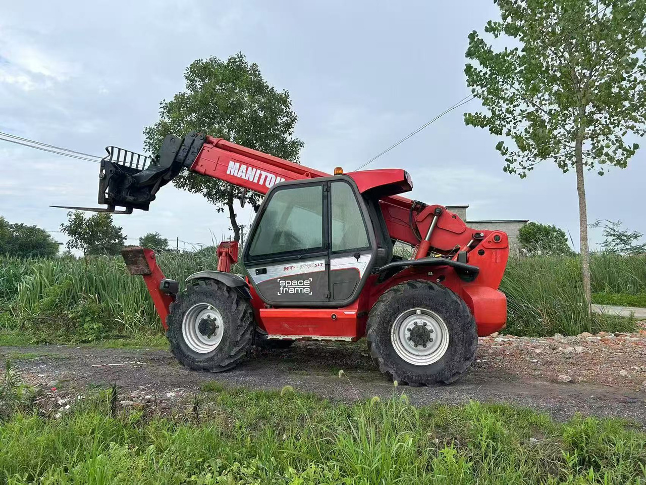 MANITOU MT-1740 - Teleskopinis krautuvas: foto 1 MANITOU MT-1740 - Teleskopinis krautuvas: foto 1