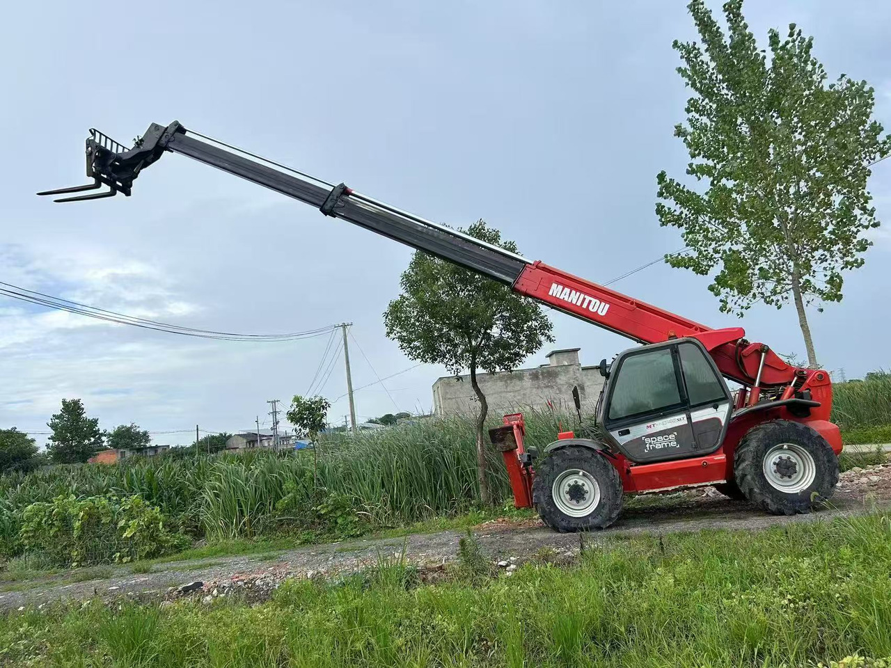 MANITOU MT-1740 - Teleskopinis krautuvas: foto 2 MANITOU MT-1740 - Teleskopinis krautuvas: foto 2