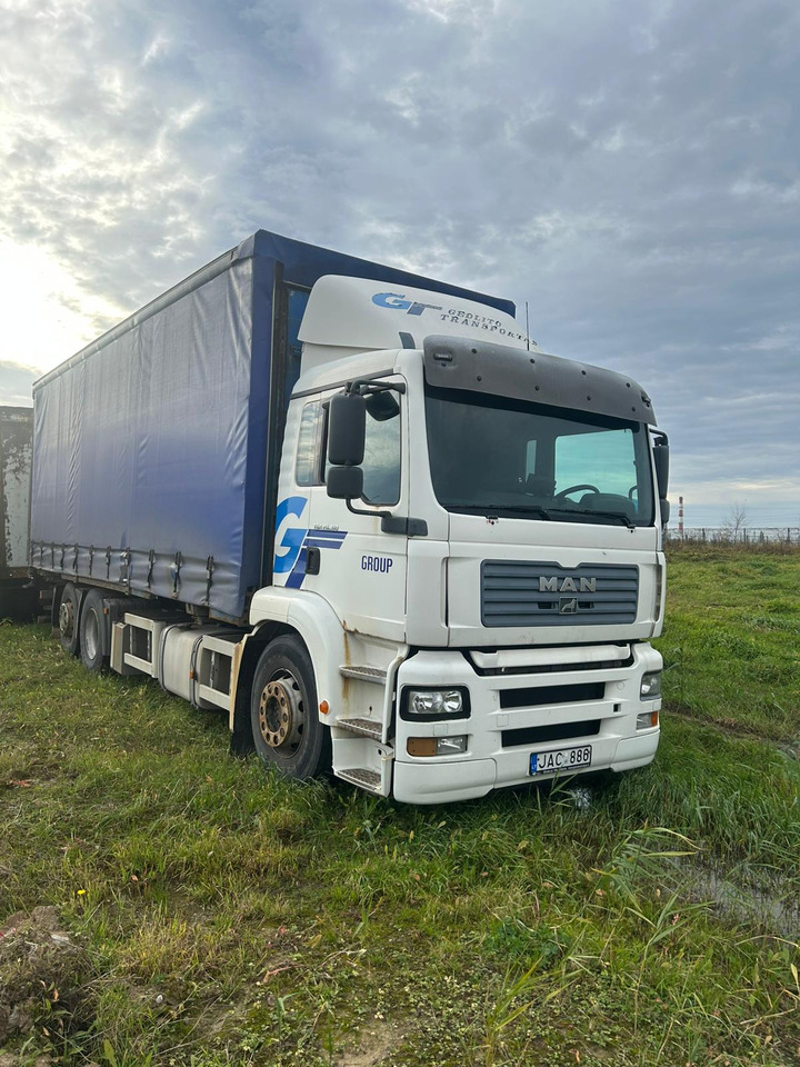 MAN TGA 26.310 - Tentinis sunkvežimis: foto 1 MAN TGA 26.310 - Tentinis sunkvežimis: foto 1