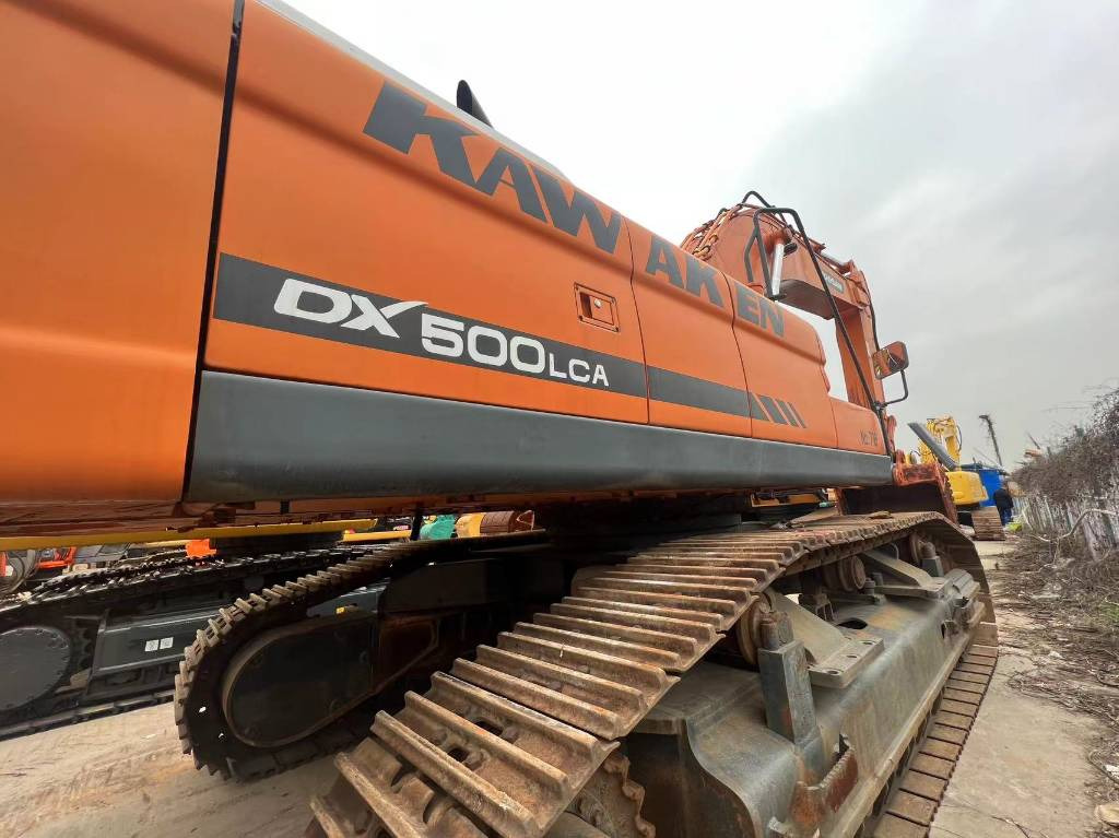 Doosan DX 500 LCA - Vikšrinis ekskavatorius: foto 1 Doosan DX 500 LCA - Vikšrinis ekskavatorius: foto 1
