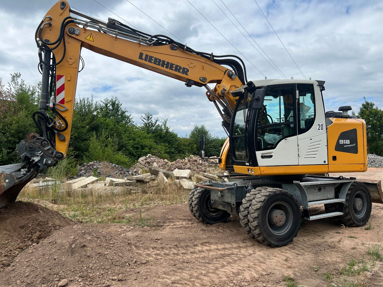 Liebherr A 918 Compact Likufix SW 48 - Ratinis ekskavatorius: foto 1 Liebherr A 918 Compact Likufix SW 48 - Ratinis ekskavatorius: foto 1