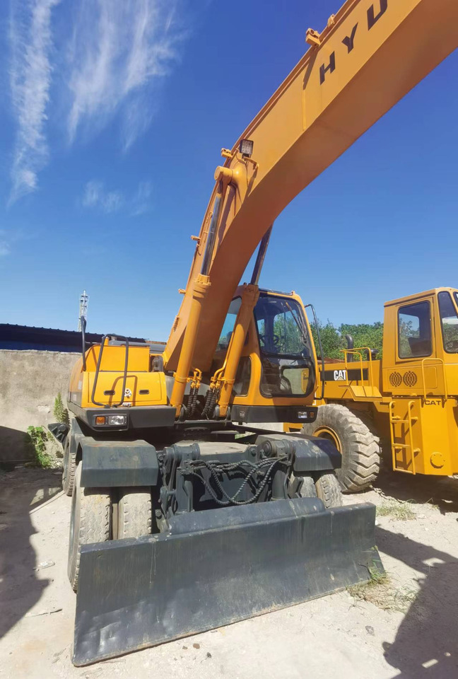 HYUNDAI ROBEX 210W-9 - Ratinis ekskavatorius: foto 5 HYUNDAI ROBEX 210W-9 - Ratinis ekskavatorius: foto 5