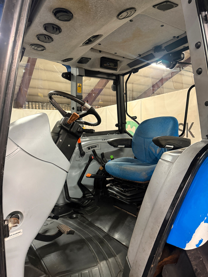 Traktorius New Holland T5060: foto 12