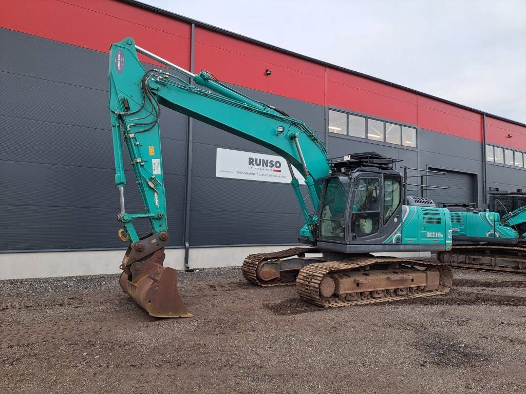 Kobelco SK 210 LC-10 - Vikšrinis ekskavatorius: foto 1 Kobelco SK 210 LC-10 - Vikšrinis ekskavatorius: foto 1