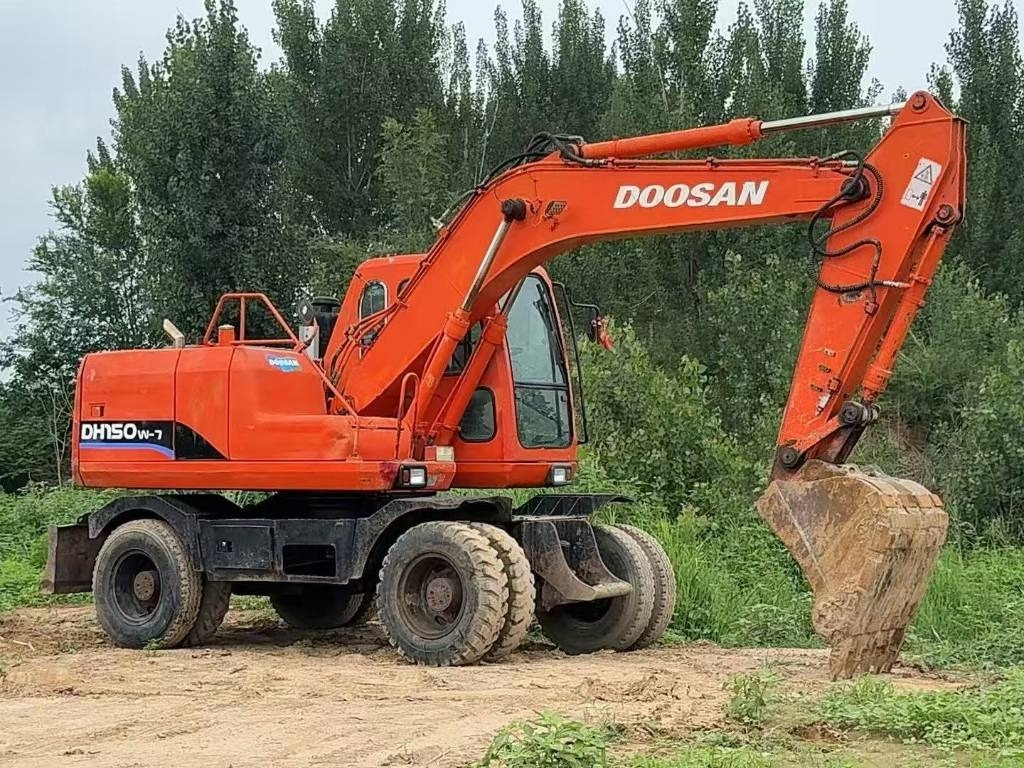 Doosan DH 150 W-7 - Ratinis ekskavatorius: foto 1 Doosan DH 150 W-7 - Ratinis ekskavatorius: foto 1