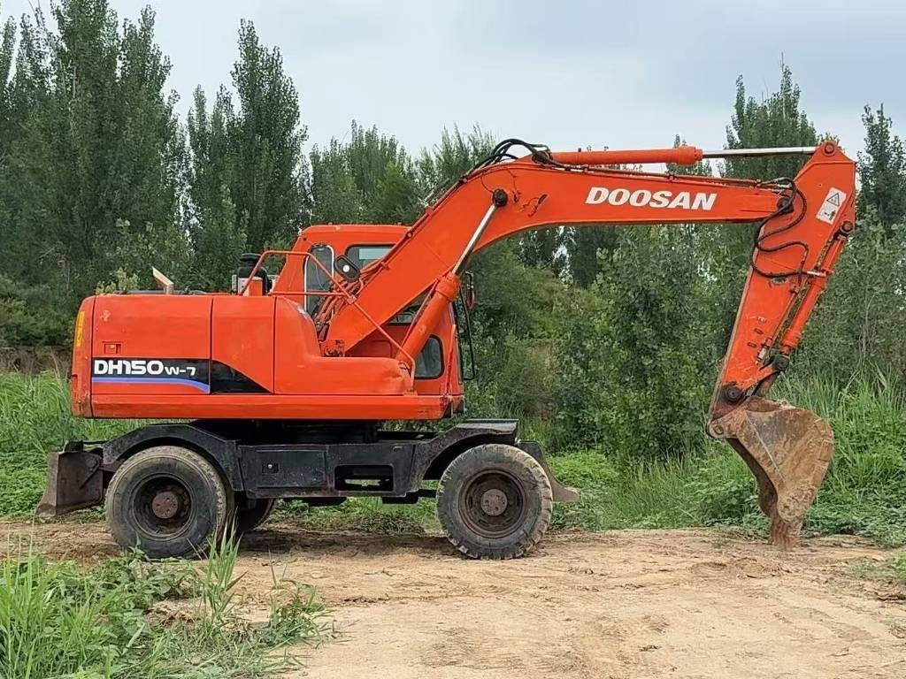 Doosan DH 150 W-7 - Ratinis ekskavatorius: foto 2 Doosan DH 150 W-7 - Ratinis ekskavatorius: foto 2