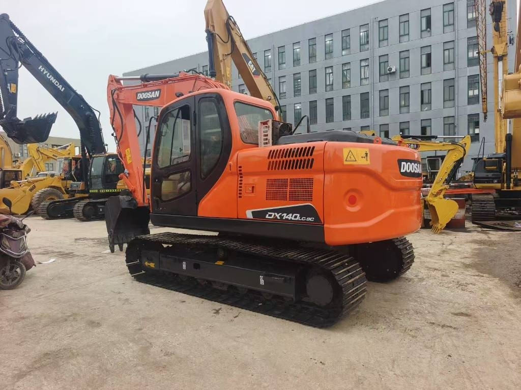 Doosan DX 140 - Vikšrinis ekskavatorius: foto 1 Doosan DX 140 - Vikšrinis ekskavatorius: foto 1