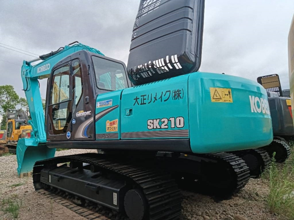 Kobelco SK 210 - Vikšrinis ekskavatorius: foto 1 Kobelco SK 210 - Vikšrinis ekskavatorius: foto 1
